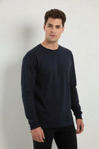 Men's navy long sleeve T-shirt by SpectraUSA, casual fit with crew neckline and soft fabric, shown on a hanger.