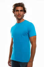 Men's Cotton Perfection Crew by SpectraUSA in dark colors, shown from the side with turquoise accents on a model.