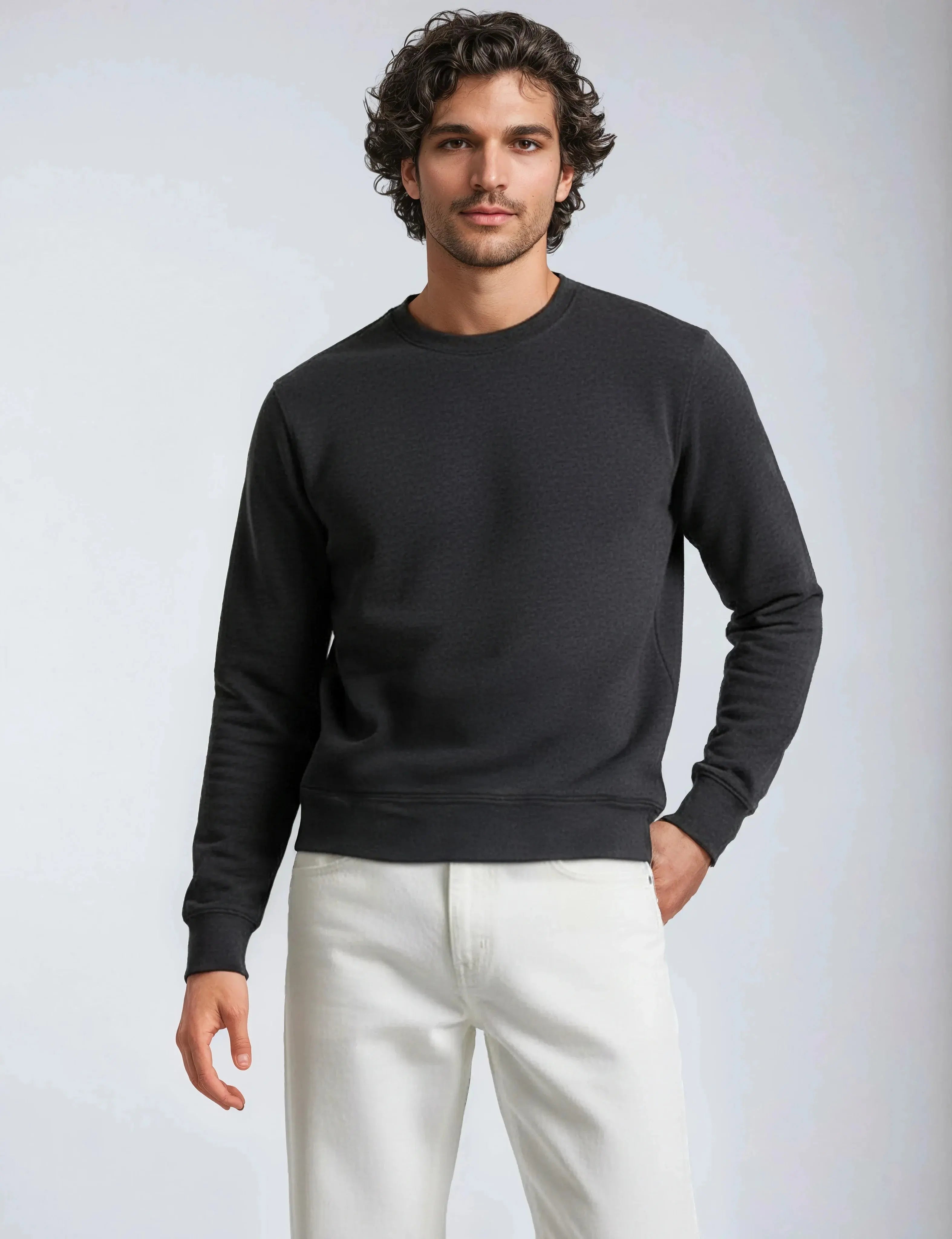 Black fleece crew neck sweatshirt by SpectraUSA, shown on a man, with a comfortable, casual fit and classic design.