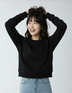 Black fleece crew neck sweatshirt by SpectraUSA for women, showcasing a comfortable fit and classic style.