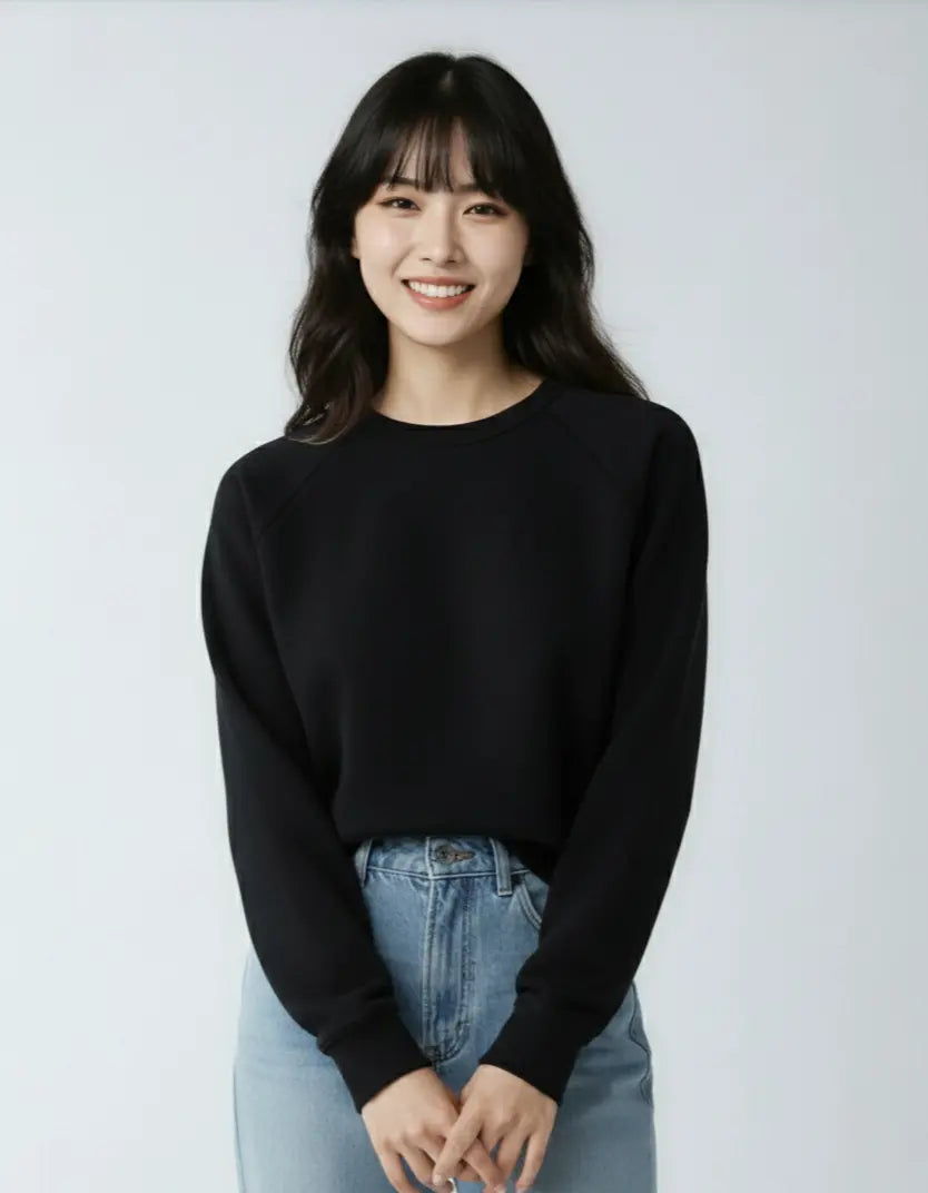 Black fleece crew neck sweatshirt by SpectraUSA, designed for women, shown on a plain background.