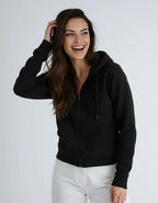 Women wearing SpectraUSA heavyweight fleece zip hoodie P2017, showcasing its cozy fit and front zipper detail.