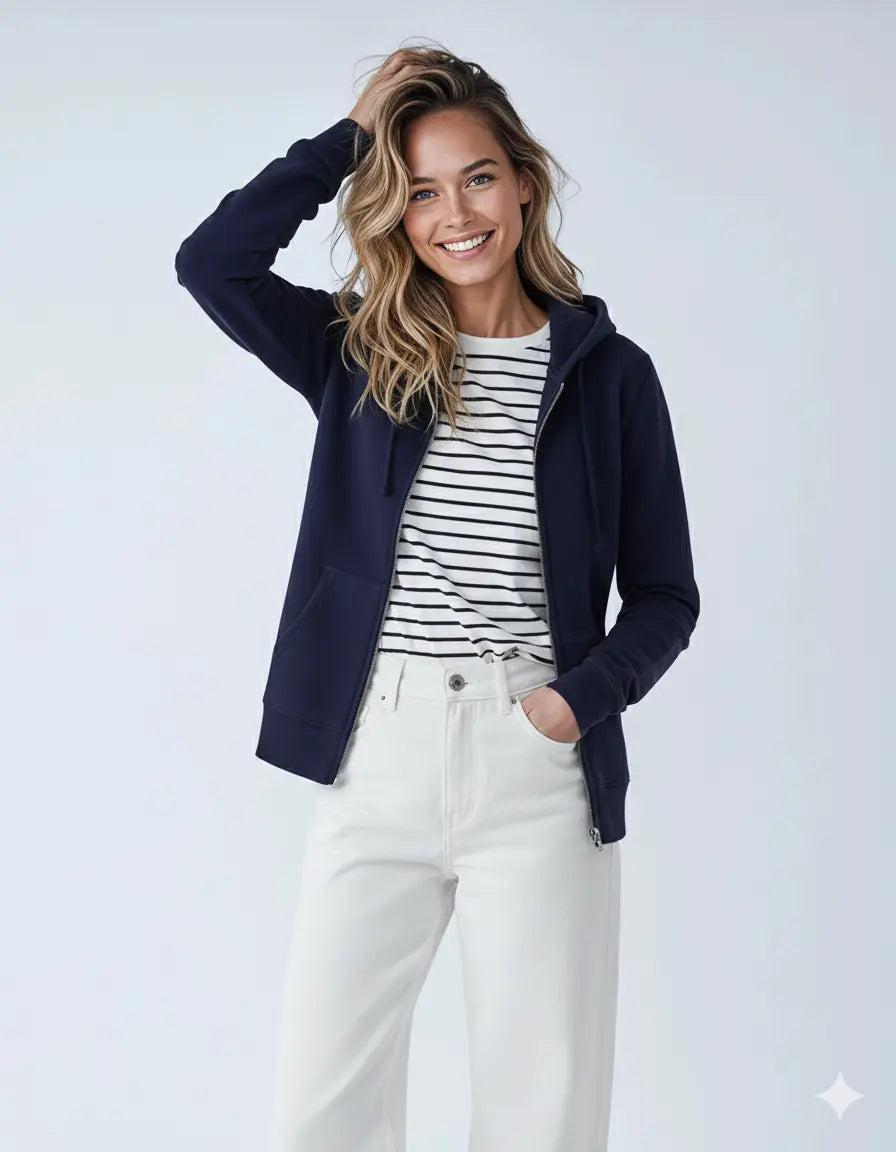 Unisex navy zip hoodie made of midweight fleece by SpectraUSA, displayed with women’s bottom clothing in the image.