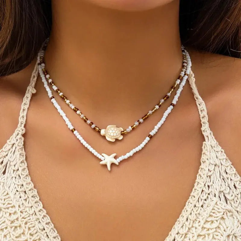 Bohemian multi-layered shell and rice bead necklace - Blade & Thread