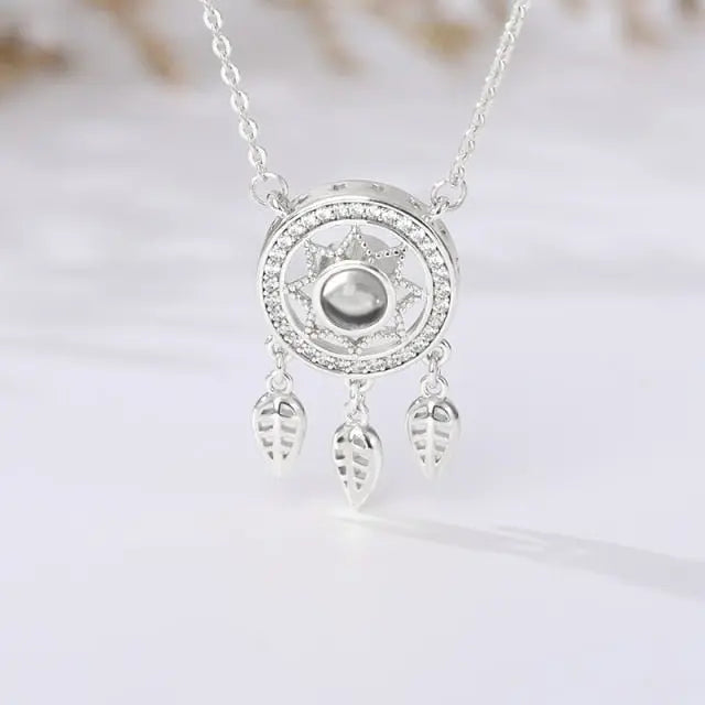 Dream catcher necklace hollow 100 language necklaces - Blade & Thread