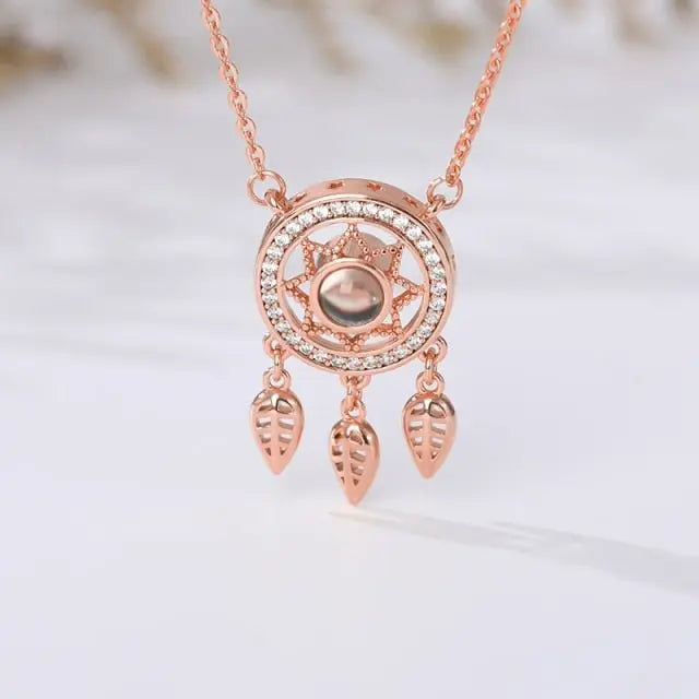 Dream catcher necklace hollow 100 language necklaces - Blade & Thread
