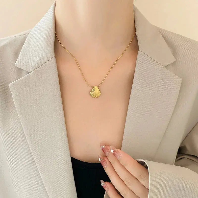gold shell necklace - Blade & Thread