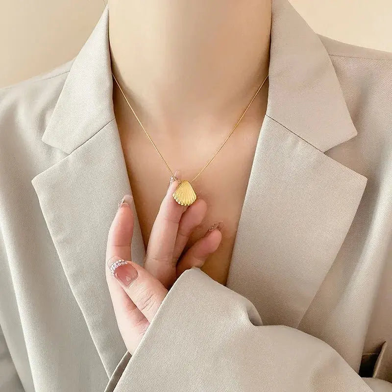 gold shell necklace - Blade & Thread