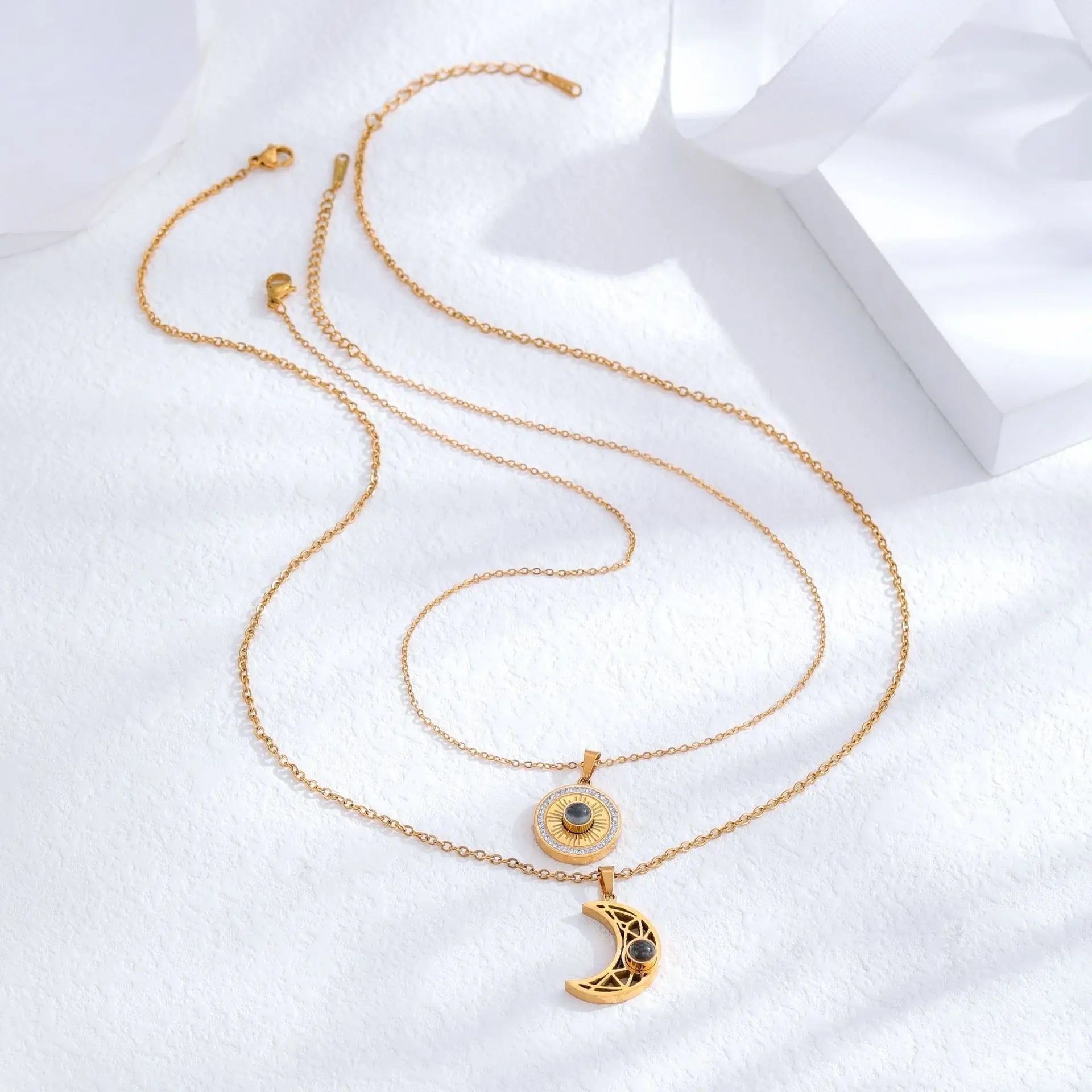Gold sun and moon projection matching necklaces for couples - Blade & Thread
