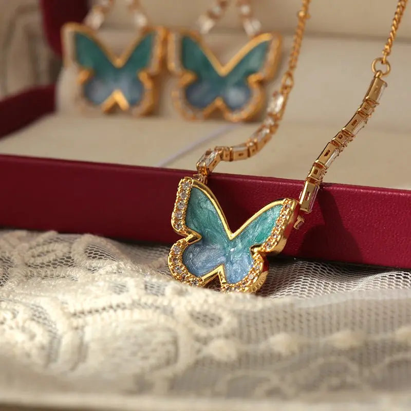 Gradient blue enamel butterfly necklace - Blade & Thread