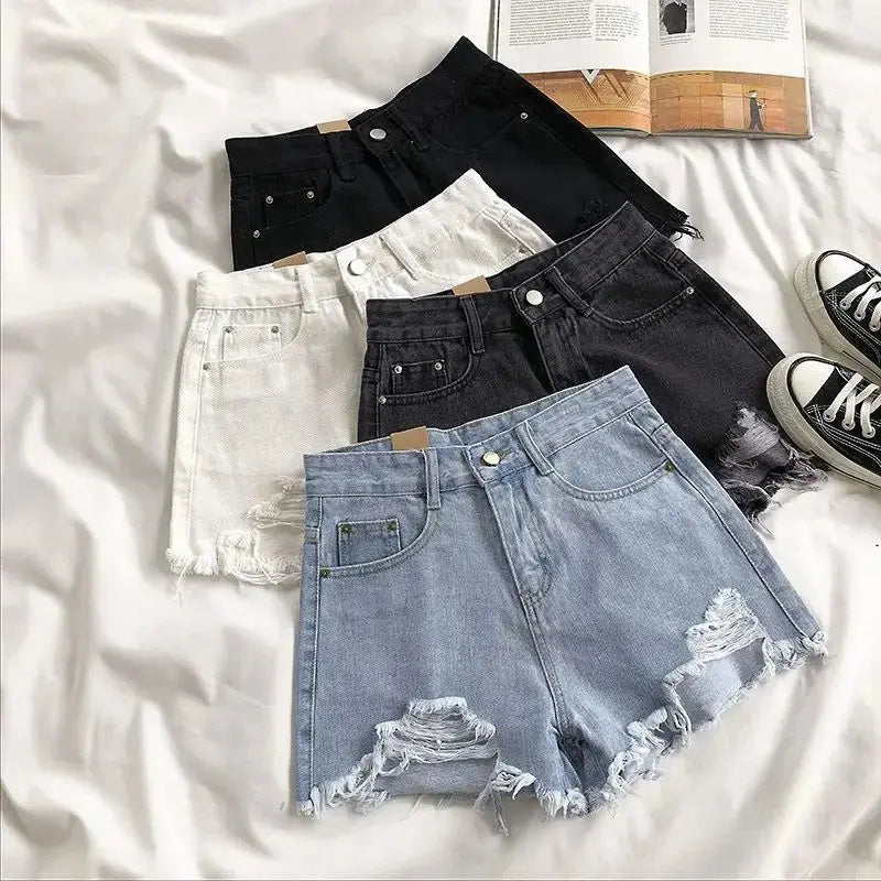 Pocket Tassel Perforated Denim Shorts Female - Blade & Thread