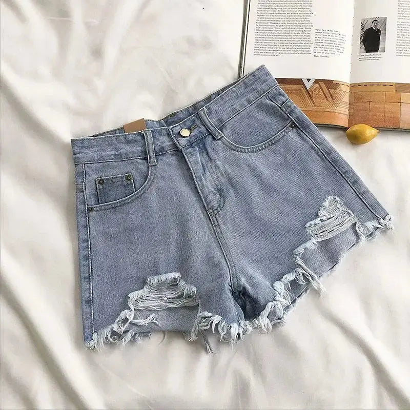 Pocket Tassel Perforated Denim Shorts Female - Blade & Thread