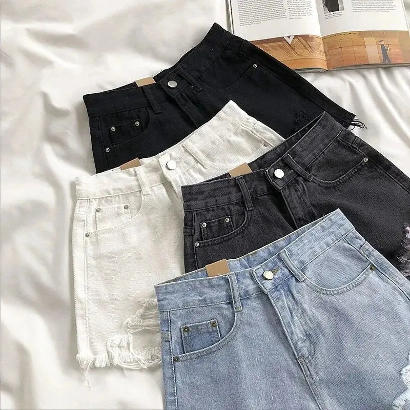 Pocket Tassel Perforated Denim Shorts Female - Blade & Thread