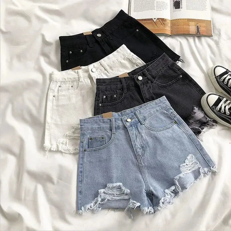 Pocket Tassel Perforated Denim Shorts Female - Blade & Thread