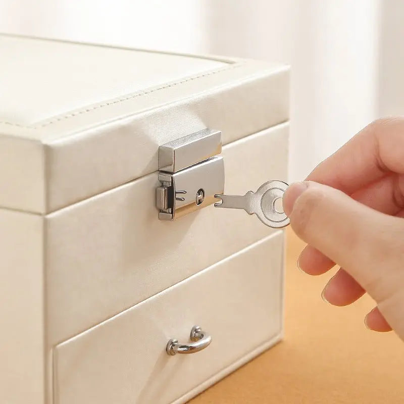 PU leather simple lock drawer table jewelry armoire - Blade & Thread