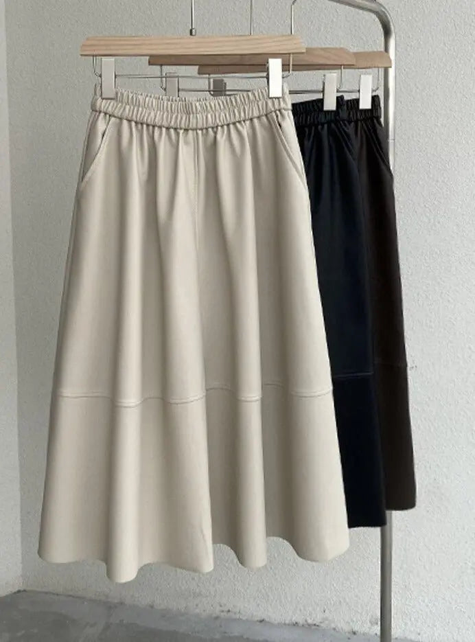 PU Skirts Elastic High Waist Pockets Faux Leather A-line Skirts - Blade & Thread