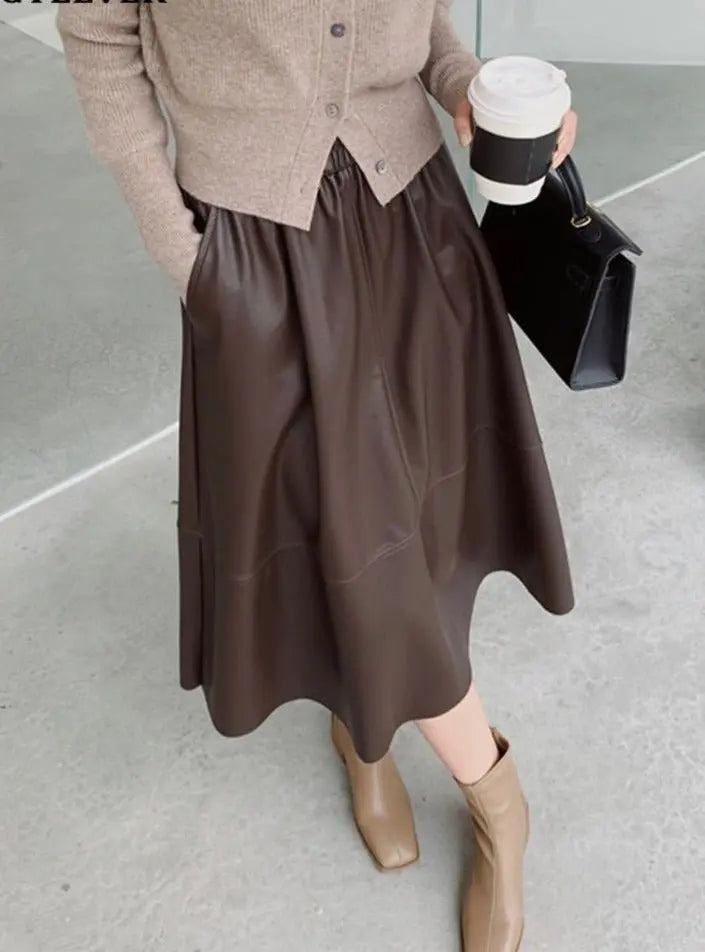 PU Skirts Elastic High Waist Pockets Faux Leather A-line Skirts - Blade & Thread