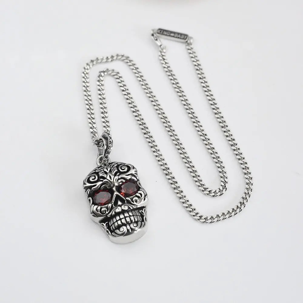 Retro Baroque garnet eye skull pendant - Blade & Thread