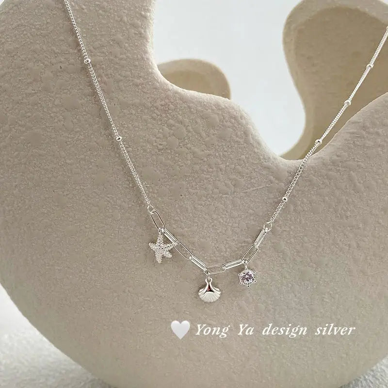 S925 sterling silver shell starfish necklace - Blade & Thread