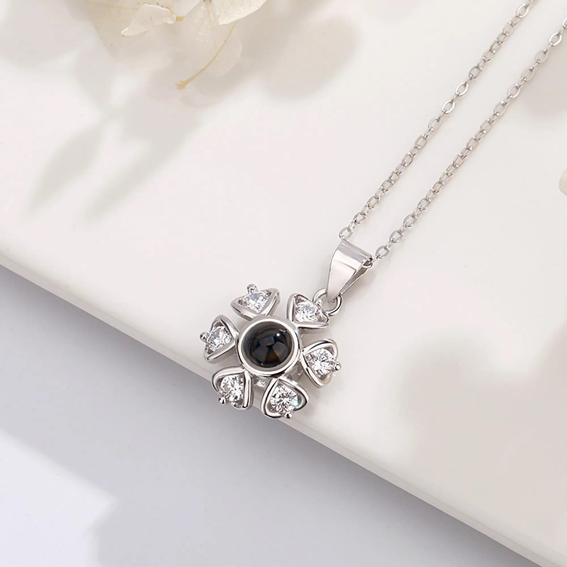 Snow projection necklace with customizable photos Projection Necklace - Blade & Thread