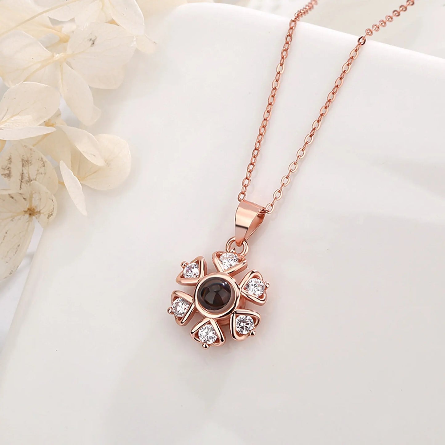 Snow projection necklace with customizable photos Projection Necklace - Blade & Thread