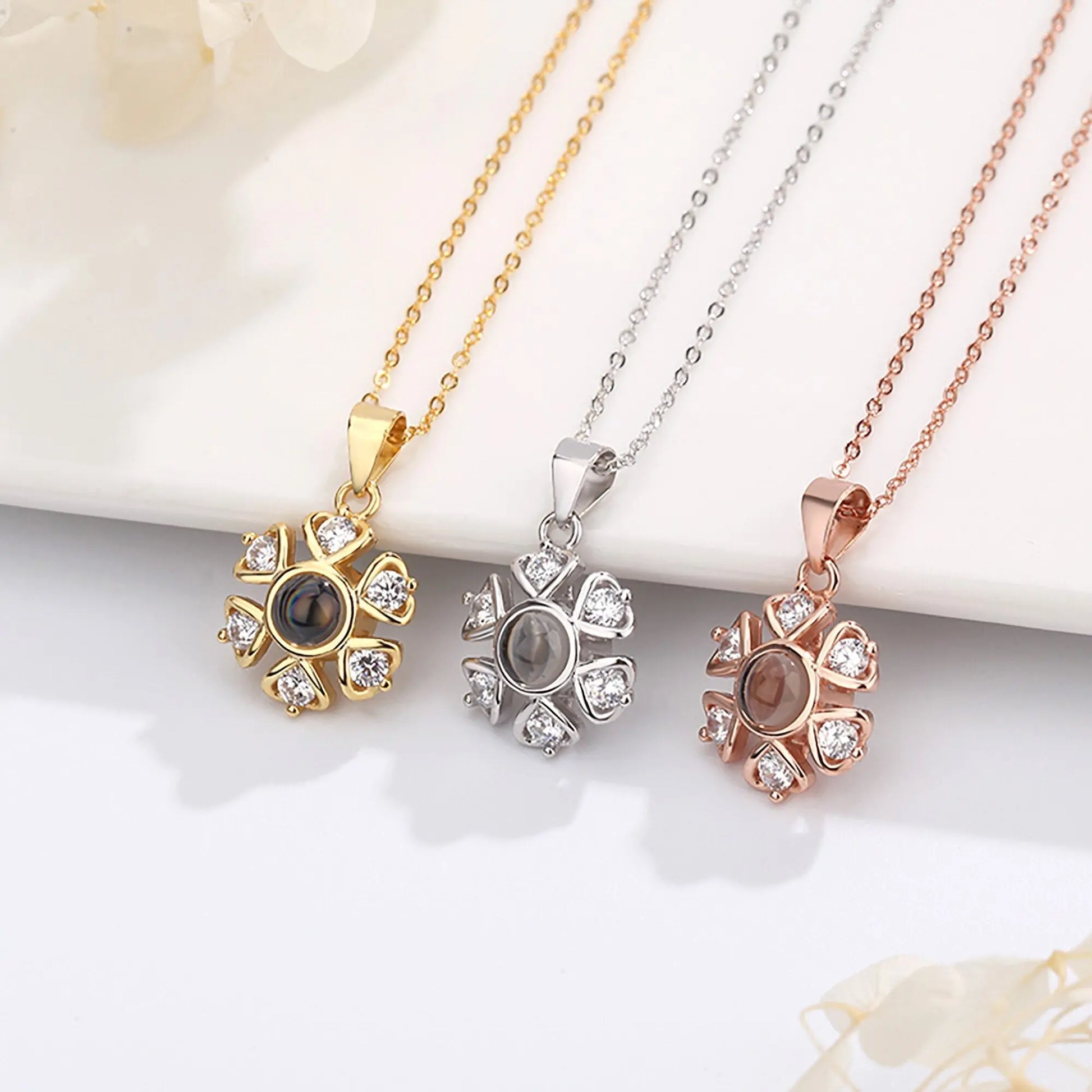 Snow projection necklace with customizable photos Projection Necklace - Blade & Thread