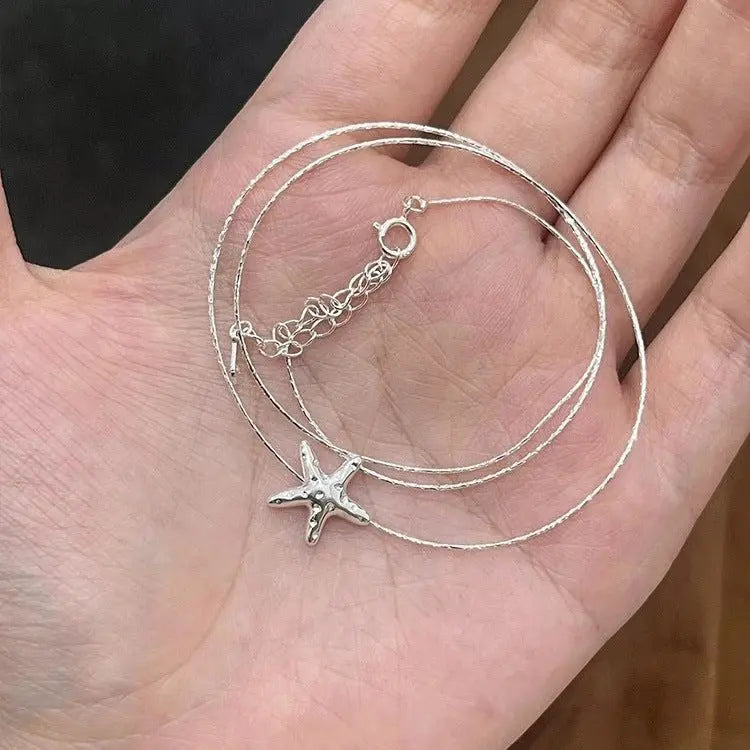 starfish s925 sterling silver lava necklace - Blade & Thread