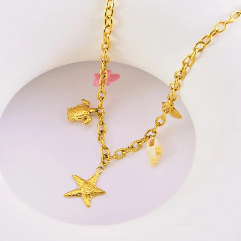 starfish turtle conch gold necklace - Blade & Thread
