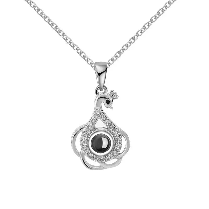 Swan projection necklace with Diamonds - Blade & Thread