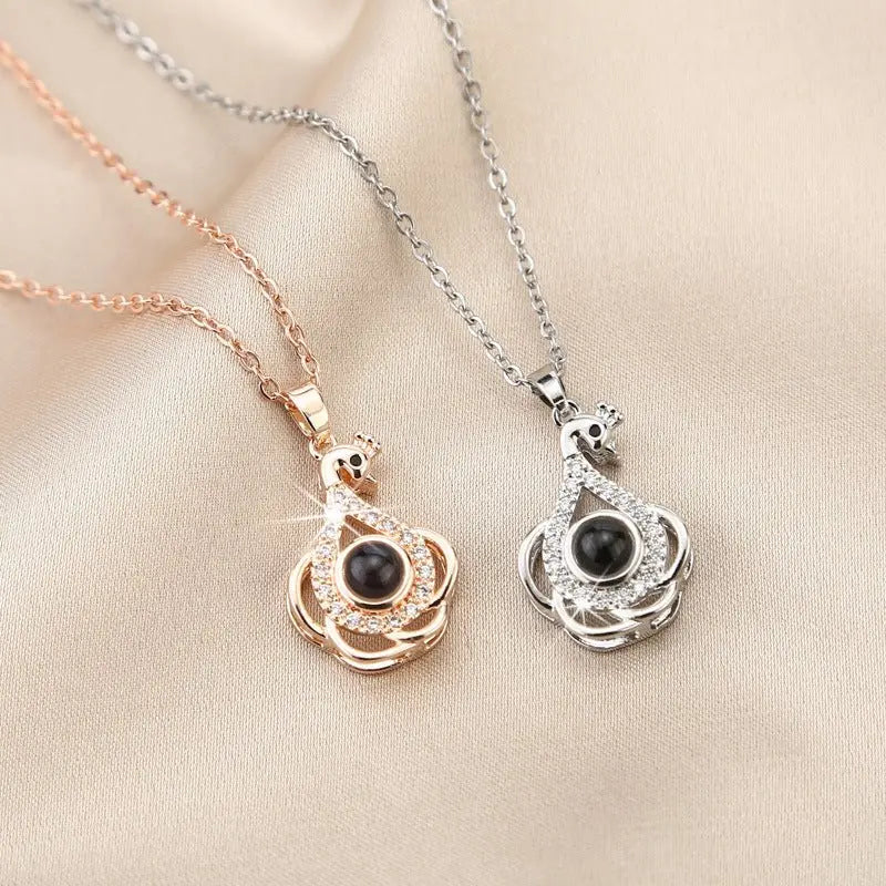 Swan projection necklace with Diamonds nowadaysfashion