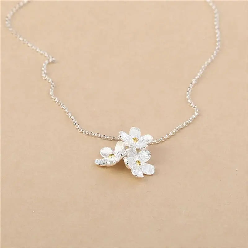 triangle forget me not necklace - Blade & Thread
